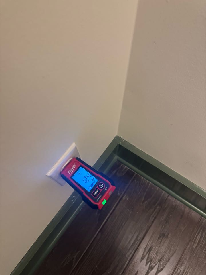 Electrician restoring power to circuit. 