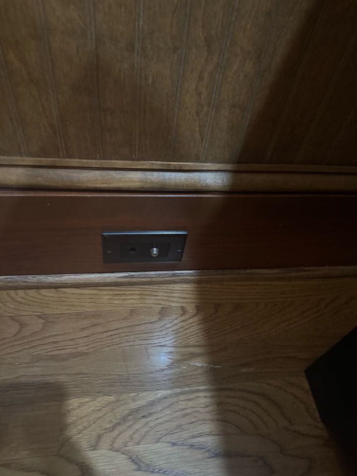 Electrician installing coax port