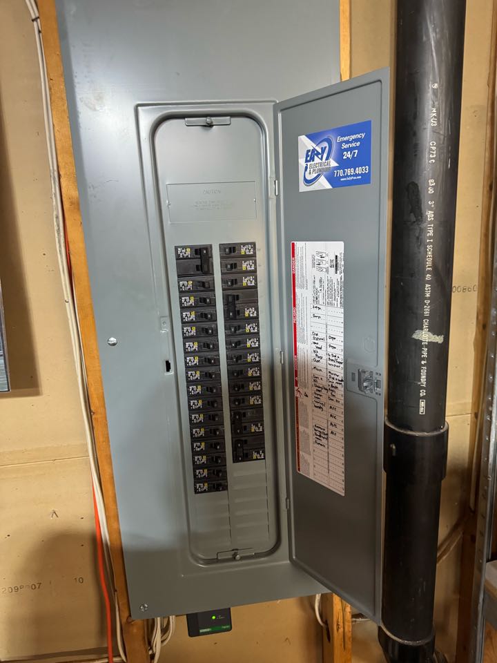 Electrician replacing panel