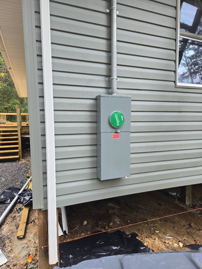 Electrician completing service upgrade 
