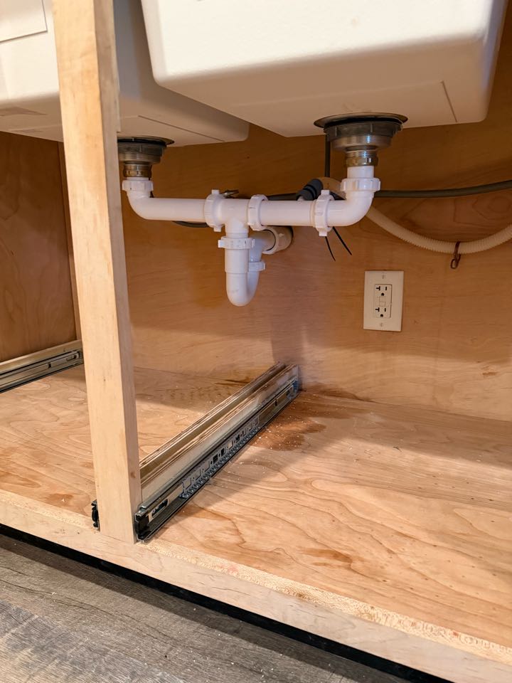 Put in kitchen sink faucet and drain  Put in kitchen sink faucet and drain