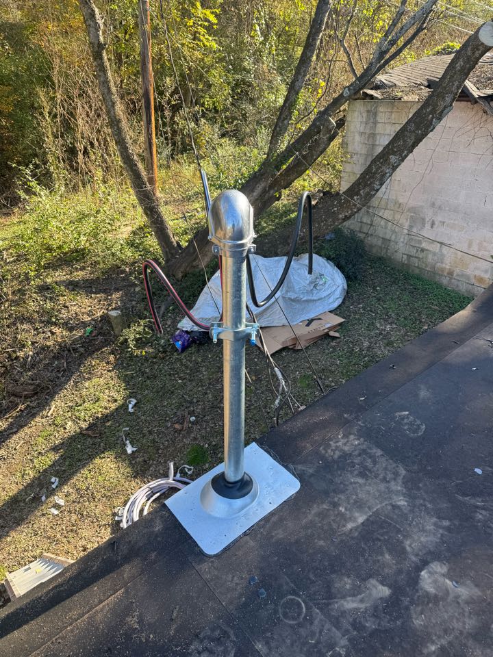 Electrician is installing a new electrical service entrance 