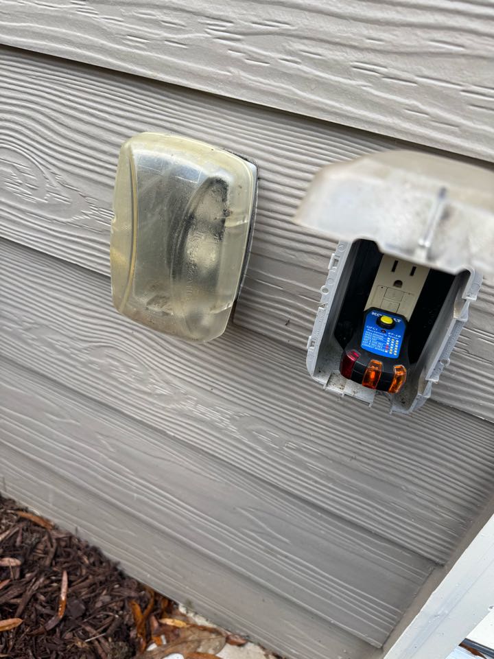 Electrician is adding a new switched outdoor gfci for Christmas lights 