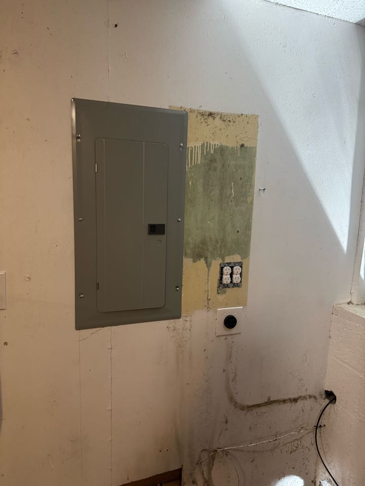 Electrician is installing a new 200 amp panel 