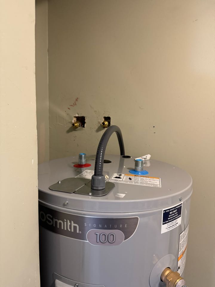 Electrician is installing a new circuit to a water heater 