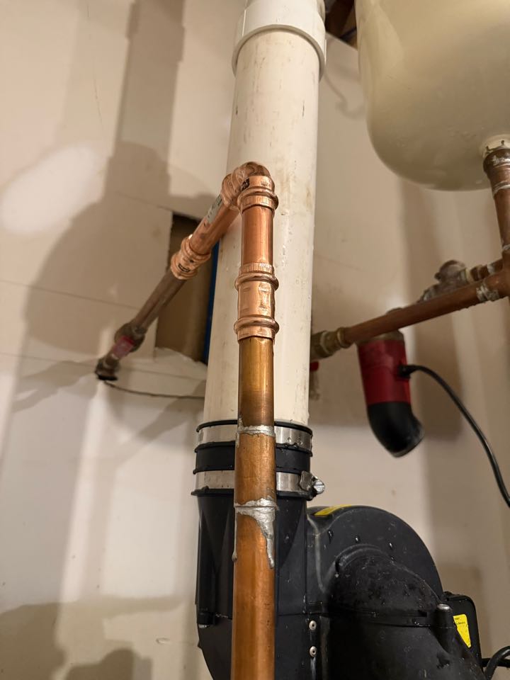 Came out and repaired a ruptured copper water line serving the water heater. Isolated the water supply, removed the damaged section of copper pipe, and installed new fittings to restore safe and reliable water flow. This repair prevented further water damage and ensured the water heater is operating properly. Professional residential plumbing repair completed quickly and efficiently.