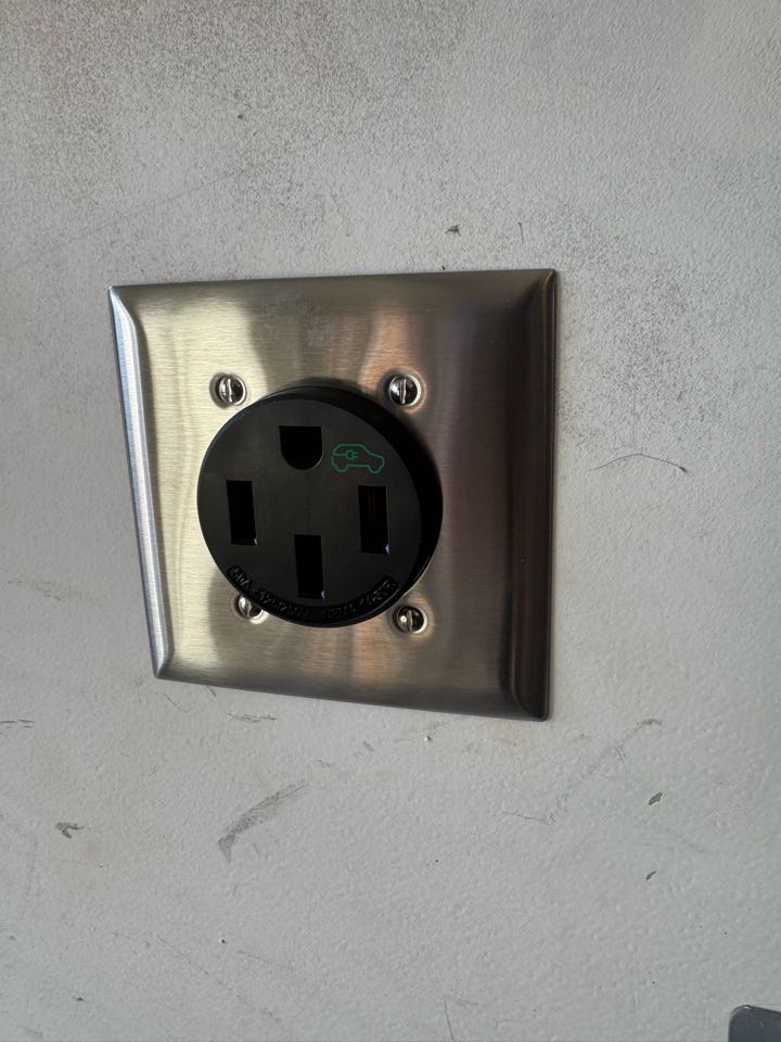 Electrician is installing a new rv charger 