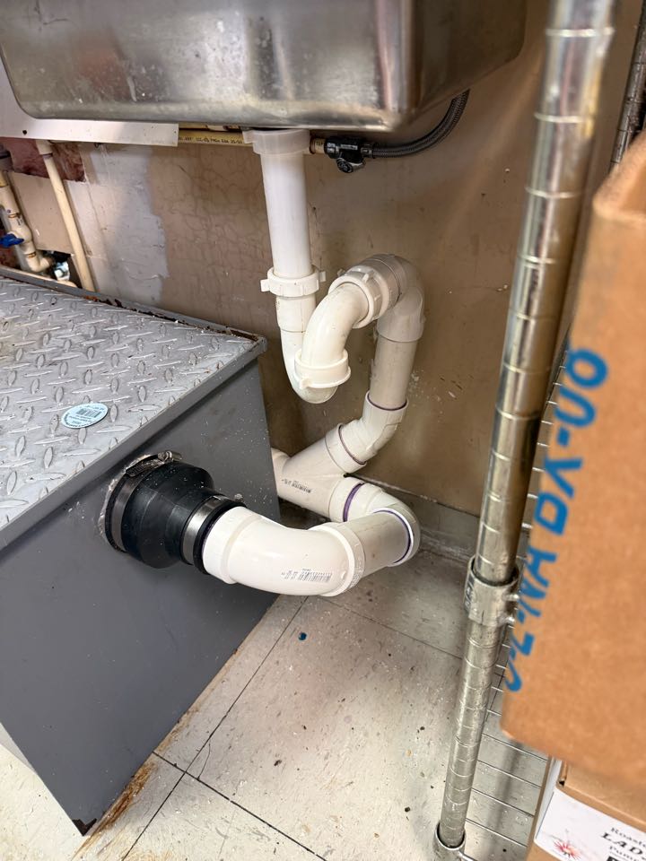 Came out and cut out a 5-foot section of 2-inch PVC drain line serving a grease trap and hand sink. Reassembled and secured the piping to meet current plumbing code and ensure proper drainage flow. Tested the system and confirmed everything is working correctly.