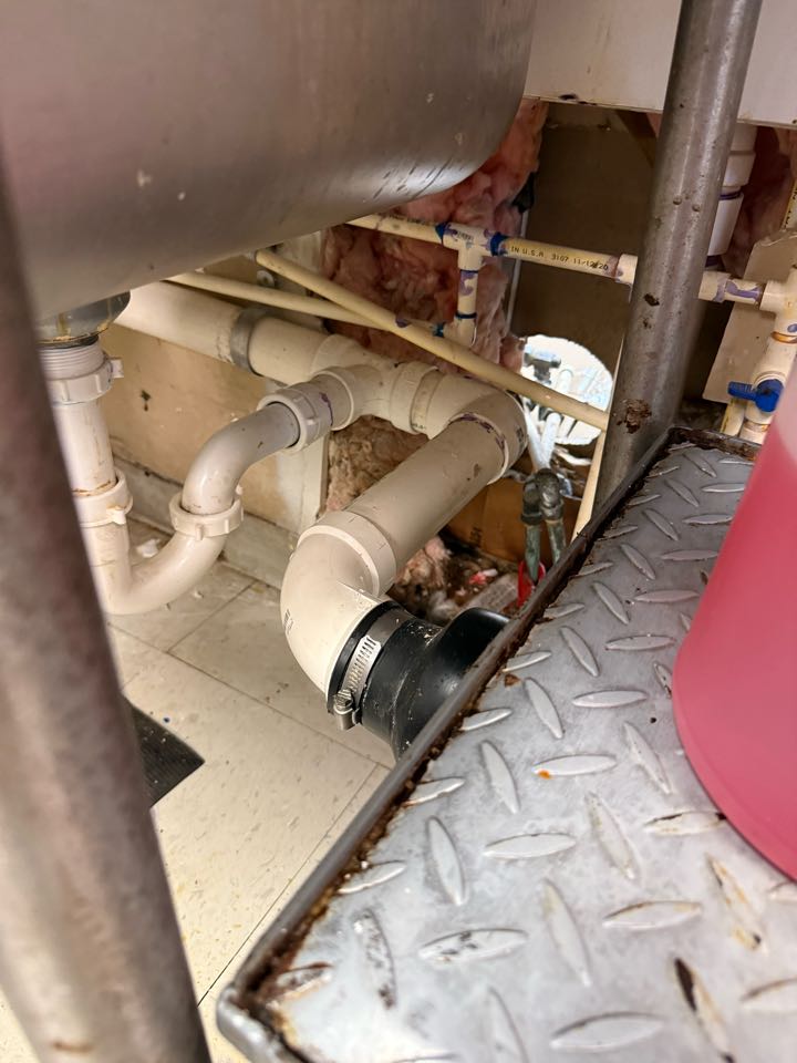Came out and cut out a 5-foot section of 2-inch PVC drain line serving a grease trap and hand sink. Reassembled and secured the piping to meet current plumbing code and ensure proper drainage flow. Tested the system and confirmed everything is working correctly.