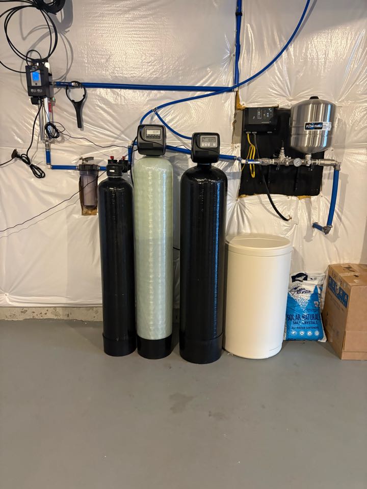 Installation of an arsenic removal system, uv disinfection system, and a sediment filter 