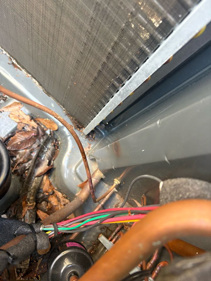 Arrived on-site to address a small rub out in the true low copper line soldered hole. First, I carefully inspected the area to identify the issue. Next, I pulled a thorough vacuum on the system to remove any air and moisture, ensuring optimal performance. After confirming the vacuum was complete, I charged the system with the appropriate refrigerant. Throughout the process, I maintained clear communication with the customer, explaining each step and addressing any concerns. The system was successfully restored, and the customer was satisfied with the restored functionality.