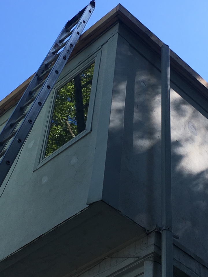 West Orange, NJ - Building out the fascias for vertical siding installation in West Orange, NJ West Orange, NJ - Building out the fascias for vertical siding installation in West Orange, NJ
