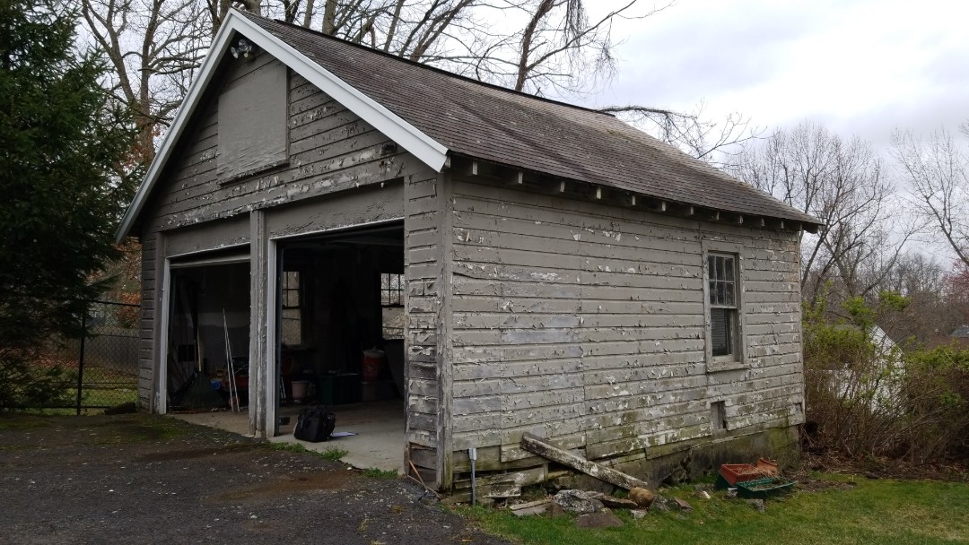 Livingston, NJ - This garage knees siding and a roof in Livingston New Jersey Livingston, NJ - This garage knees siding and a roof in Livingston New Jersey