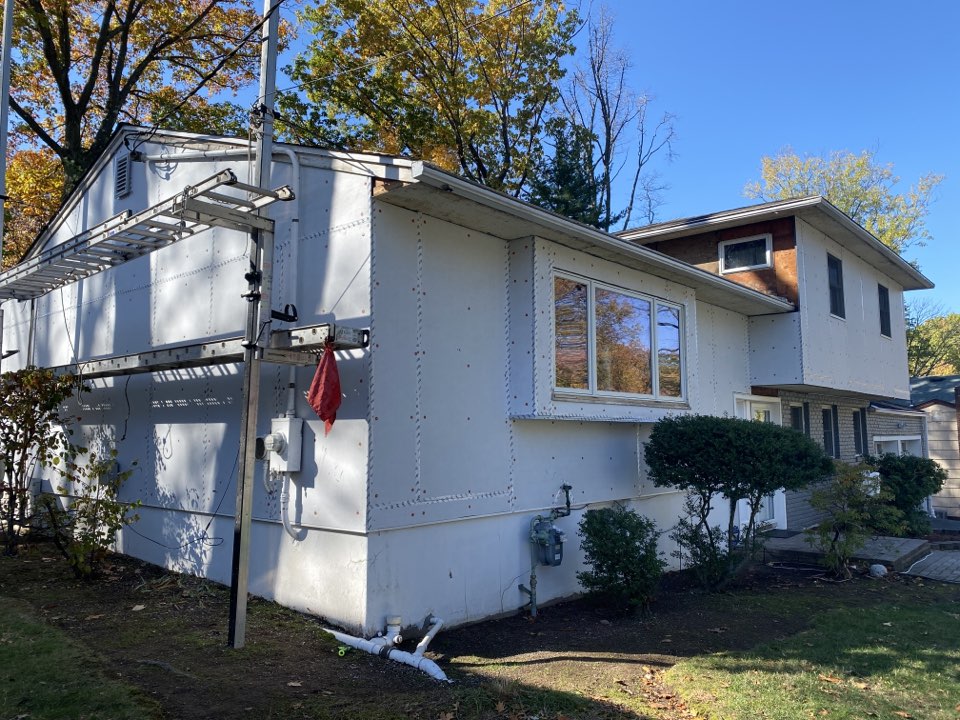 West Orange, NJ - Siding project underway in West Orange, NJ. 1” BASF Neopor being installed as part of an NJIT Study. The siding will be CertainTeed double 5” Dutchlap Sterling Gray Vinyl Siding. West Orange, NJ - Siding project underway in West Orange, NJ. 1” BASF Neopor being installed as part of an NJIT Study. The siding will be CertainTeed double 5” Dutchlap Sterling Gray Vinyl Siding.