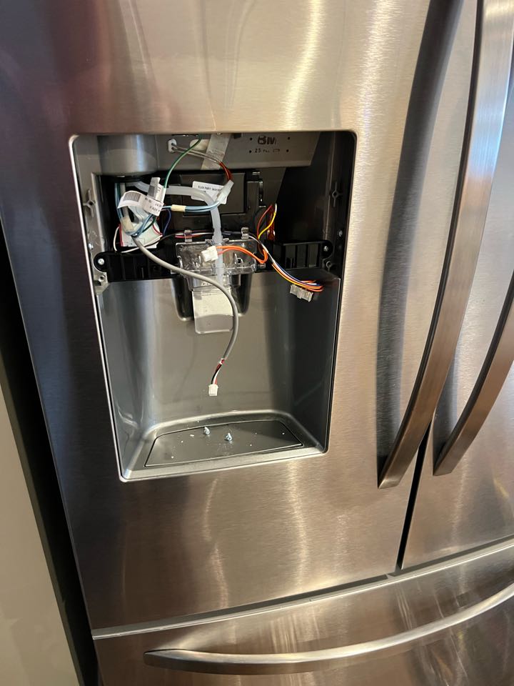Replaced broken water and ice dispenser assembly on Kenmore refrigerator