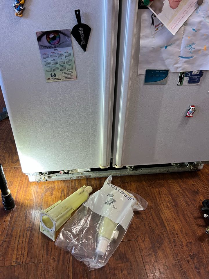 Replaced leaking water filter housing on KitchenAid refrigerator