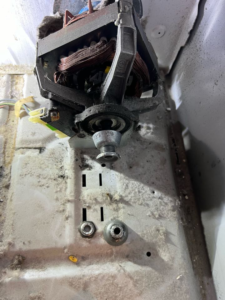 Replaced broken motor belt pulley on whirlpool dryer