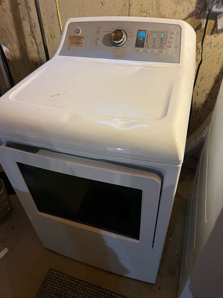 Replaced worn out front housing support on GE dryer