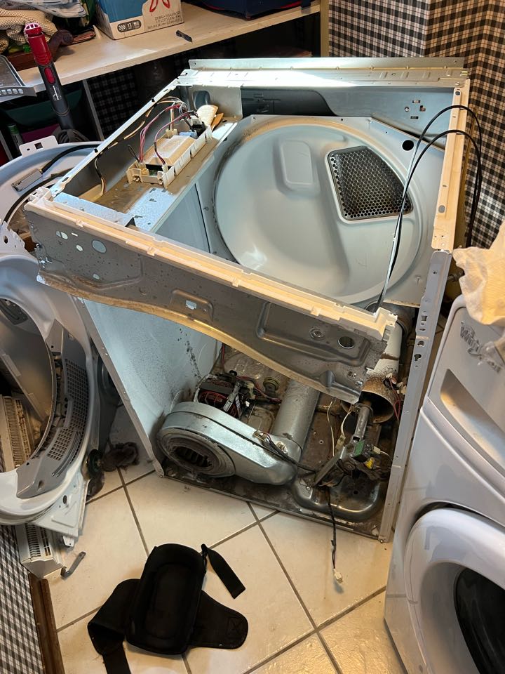 Replaced worn out idler bracket on whirlpool dryer