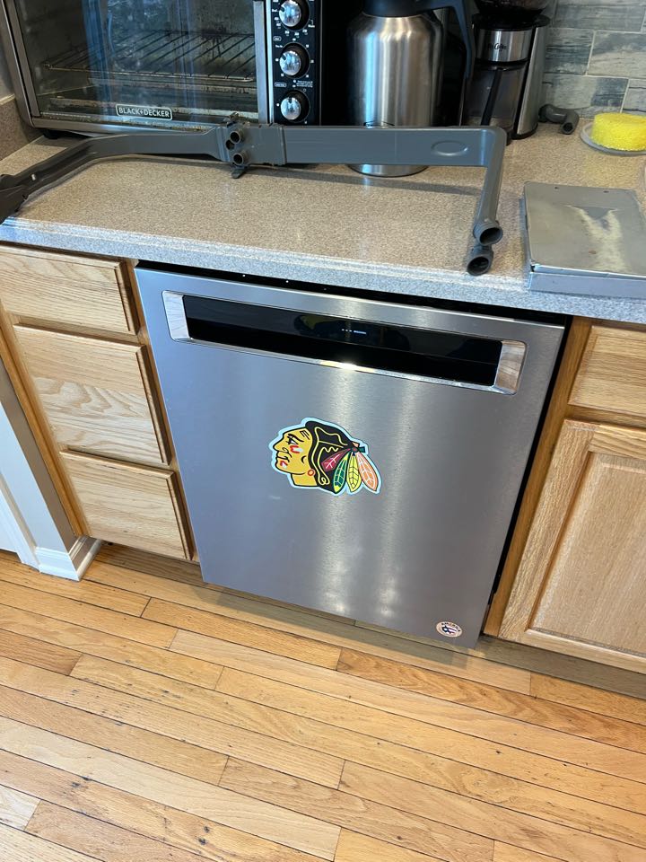 Replaced broken water spray tube on KitchenAid dishwasher