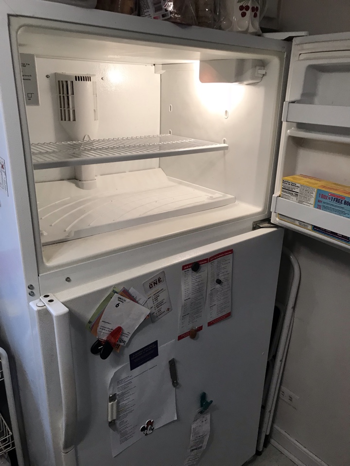 Unclogged freezer drain on Kenmore refrigerator that was leaking water.