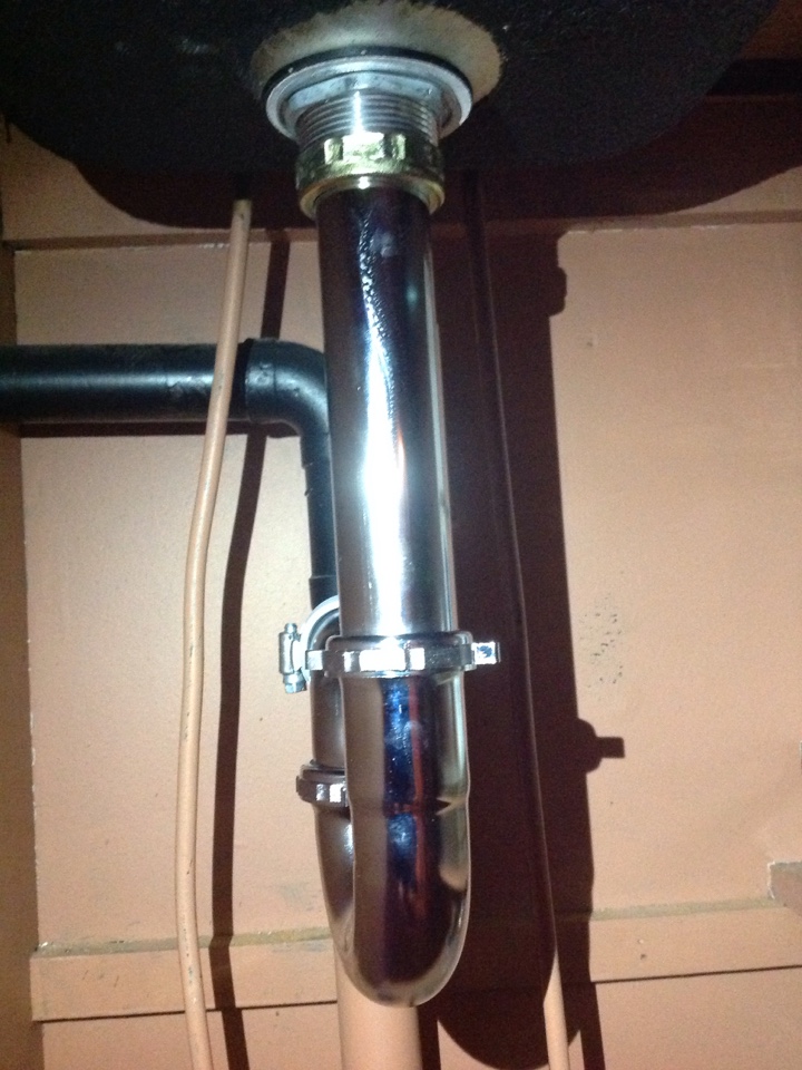 Replaced drainage on wet bar sink. New sink strainer, tail piece and trap. 