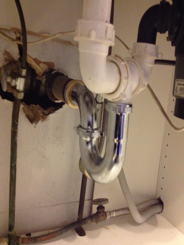 Snake kitchen sink and replace trap