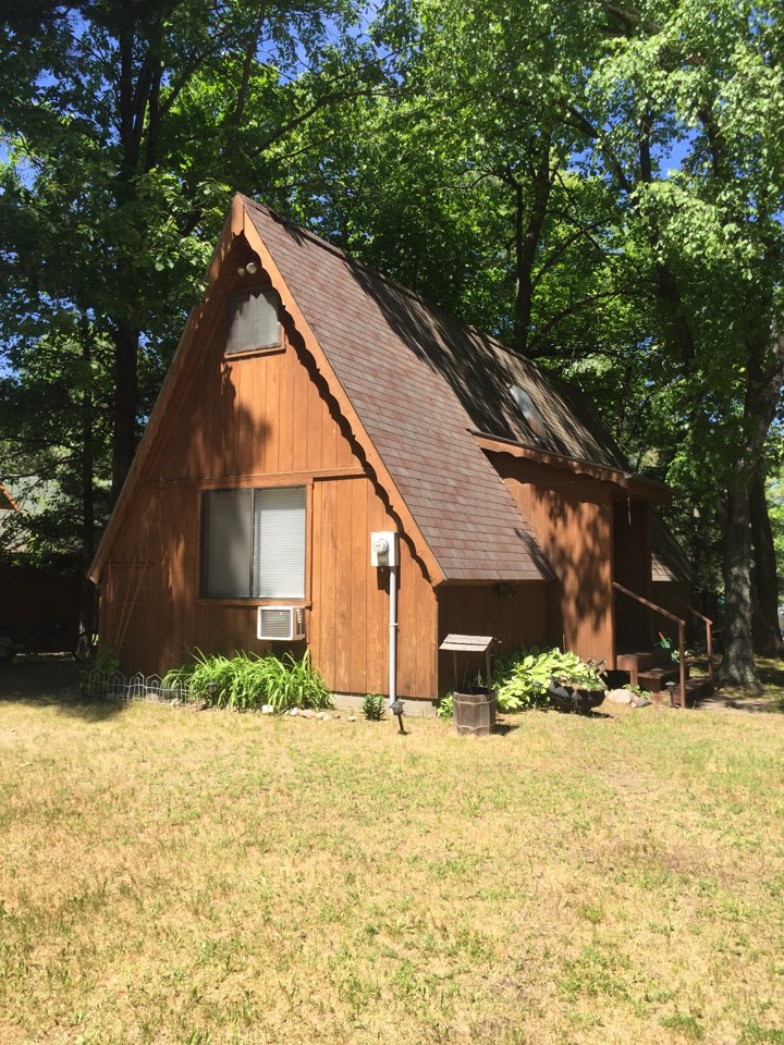Crosslake, MN - Doing a roofing estimate in Crosslake, MN on the whitefish chain of lakes. A frame roof. 21/12 roof pitch! New GAF Timberline HD shingles and new skylights. Crosslake, MN - Doing a roofing estimate in Crosslake, MN on the whitefish chain of lakes. A frame roof. 21/12 roof pitch! New GAF Timberline HD shingles and new skylights.