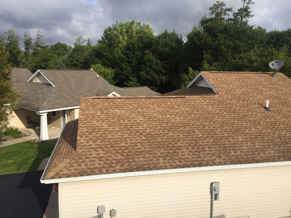 Baxter, MN - We installed two new roofs in Brainerd, MN. The closest one is GAF Timberline HD in the Shakewood color and the roof behind that one in the photo is in the weathered wood color Baxter, MN - We installed two new roofs in Brainerd, MN. The closest one is GAF Timberline HD in the Shakewood color and the roof behind that one in the photo is in the weathered wood color