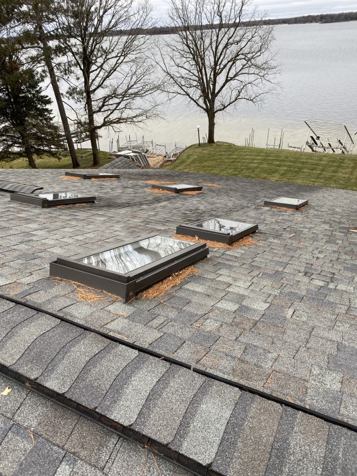 Crosslake, MN - Doing a roofing estimate in Crosslake, MN on Cross lake. Skylights! Crosslake, MN - Doing a roofing estimate in Crosslake, MN on Cross lake. Skylights!