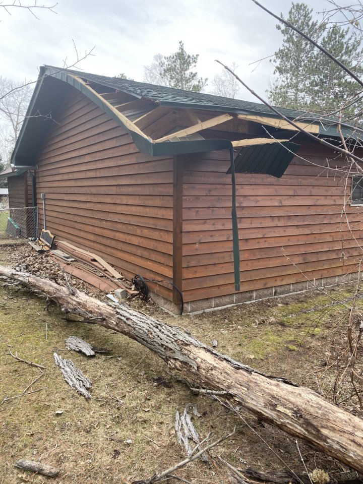 Brainerd, MN - Doing a estimate for tree damage on the roof in Brainerd, MN Brainerd, MN - Doing a estimate for tree damage on the roof in Brainerd, MN