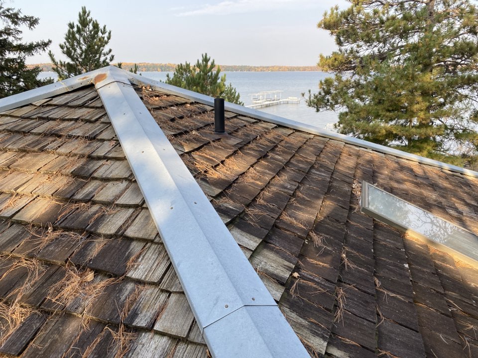 Merrifield, MN - Doing a cedar shake roofing estimate on Pelican Lake in Merrifield, MN Merrifield, MN - Doing a cedar shake roofing estimate on Pelican Lake in Merrifield, MN