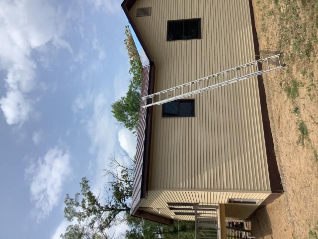Crosslake, MN - Installing new Image II Standing Seam metal on this house in Crosslake, MN. Crosslake, MN - Installing new Image II Standing Seam metal on this house in Crosslake, MN.