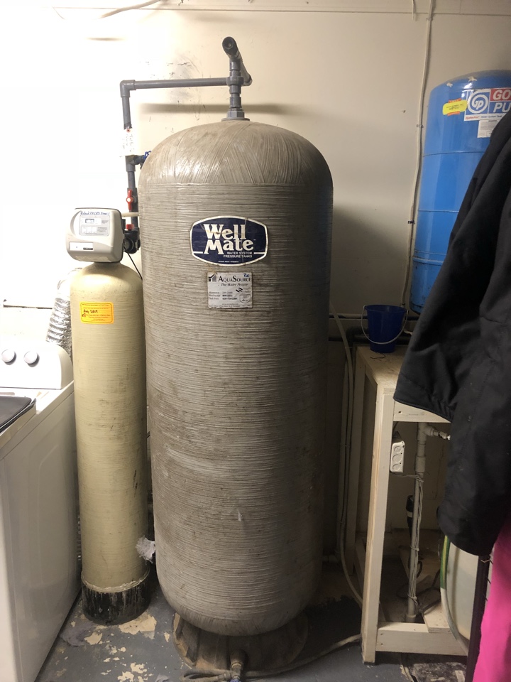 Water softener installing a water softener and a hot water tank in a tankless hot water heater placing the old Culligan water softening system and old aqua source water softening system water treatment system discount water softeners discount water systems discount filters