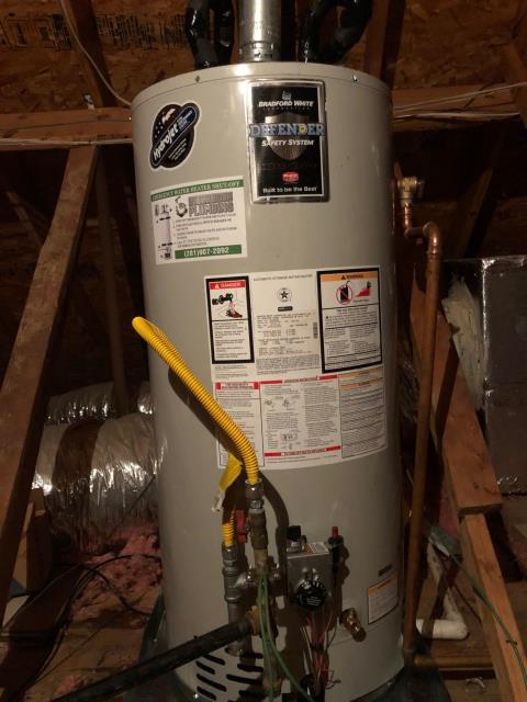 Replaced water heater in attic with Bradford White water heater for customer in Spring