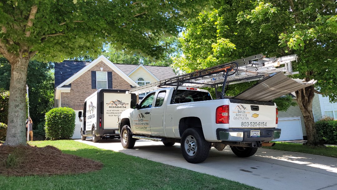 Residential shingle roof repair. Replace cap shingles at transition from garage to main house. Irmo, SC