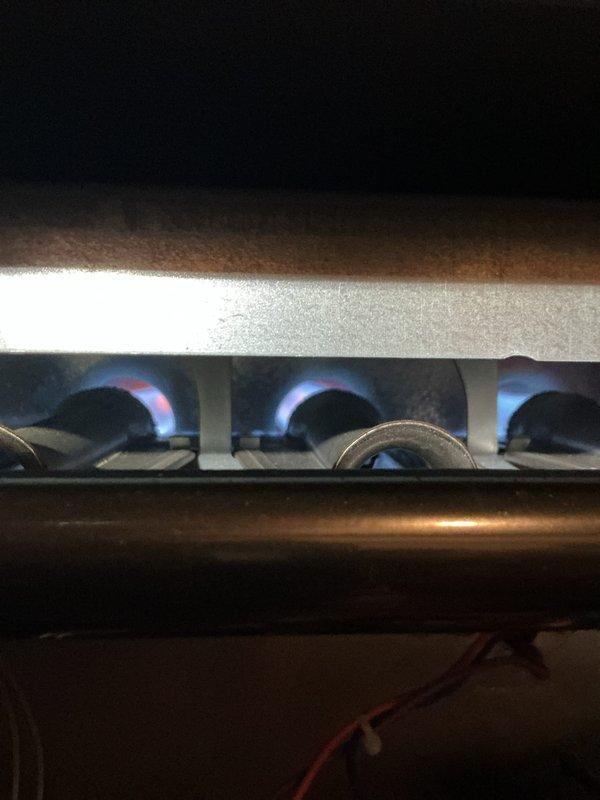 Performed Gold Furnace Inspection on 5-year-old furnace located in basement. Verified proper electrical connections and wiring integrity at control panel. Inspected gas burner system, confirming normal blue flame pattern indicating efficient combustion with no signs of malfunction. System is operating within manufacturer specifications with next maintenance recommended in 2025.