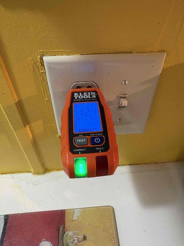 Diagnosed and resolved issue with three non-functioning outlets. Testing with Klein Tools digital tester confirmed proper voltage (120-123 VAC) and wiring configuration after repairs. Reinstalled and verified all outlets are now operating correctly with proper grounding.