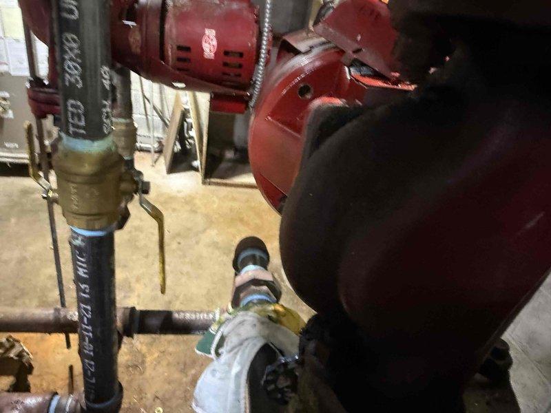 Responded to callback regarding persistent heating issue on west side of building that was previously addressed two weeks ago. Inspected hydronic system and identified circulation pump with significant dust/corrosion buildup as the source of the malfunction. Replaced defective pump components using parts acquired from Hydronic Supply under PO: 1265416-001, restoring heat function to the affected area.