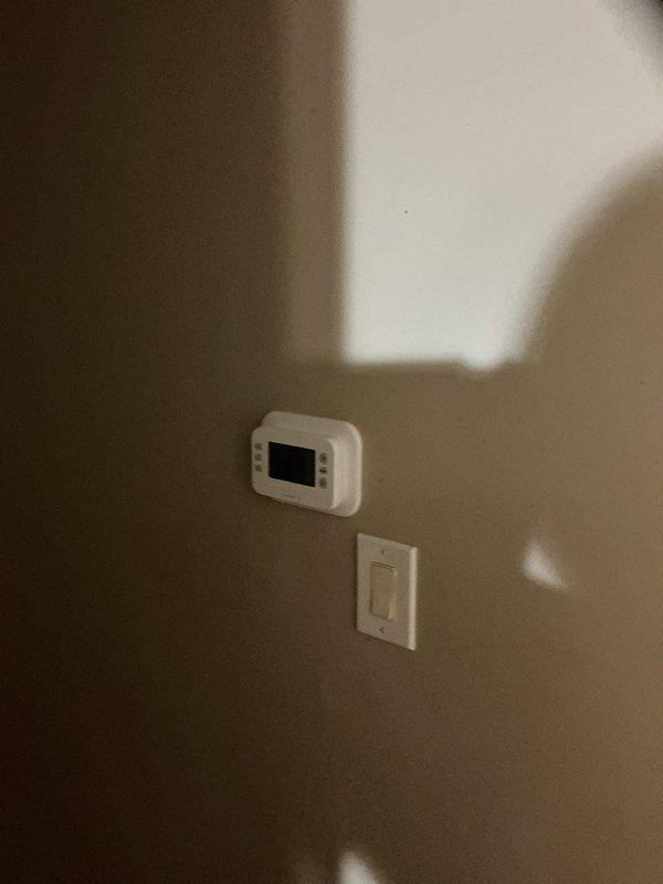 Successfully installed a complete Lennox HVAC system including a 70,000 BTU furnace, 2-ton air conditioning unit, digital thermostat, and humidifier. Connected the new AC unit on exterior pad with proper clearance from the brick wall, and installed the digital thermostat on interior wall. System was fully tested and verified operational with all manufacturer rebates documented.