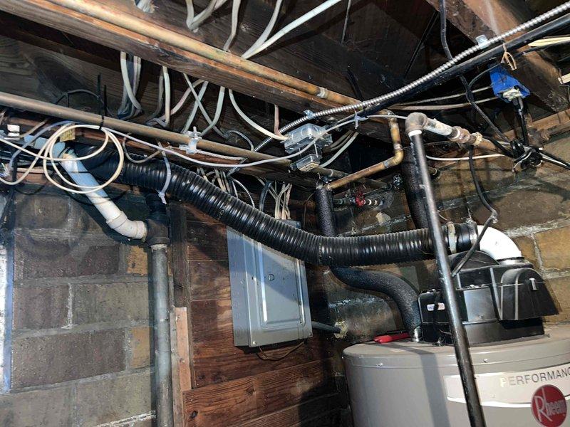 Completed Gold Boiler Inspection on steam heating system under 10 years old. Conducted combustion analysis using Bacharach analyzer, recording stack temperature of 316°F, CO2 at 8.3%, excess air at 37.1%, and CO levels at 51 ppm. System is operating within acceptable parameters with no immediate concerns identified.