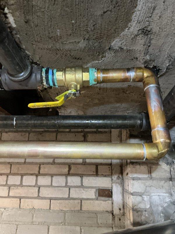 Performed city certification inspection on a 2-month-old HVAC system located in basement. Inspected gas valve assembly, burner tubes, and electrical control systems, finding all components in normal working condition. Verified proper operation of humidifier, thermostat, and hot water tank, with particular attention to the gas shutoff valve and copper piping installation.