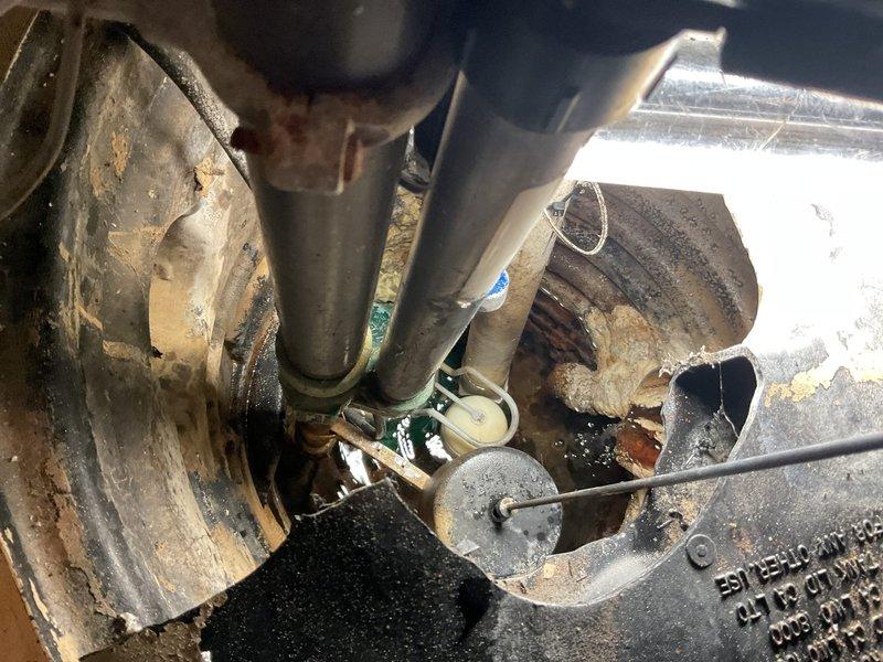 Responded to service call for nearly overflowing sump pump in basement. Inspected the system and found significant corrosion and deterioration of the pump housing with visible rust deposits throughout the well. Serviced the pump mechanism, cleaned accumulated debris, and verified proper operation of the electrical connections and discharge piping to restore normal functionality.