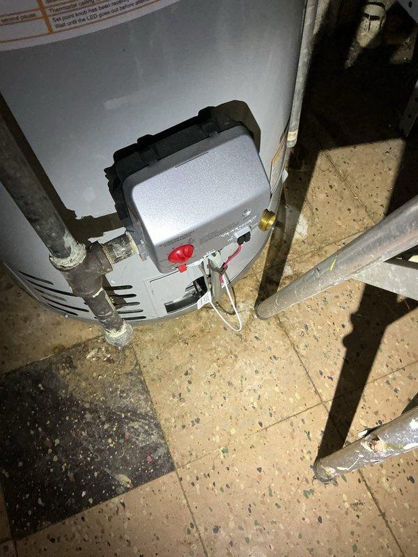 Responded to no hot water complaint for 15-year-old water heater. Upon inspection, identified failed thermocouple/gas control valve requiring replacement. Advised customer of unit's age and discussed replacement options as the most cost-effective long-term solution.