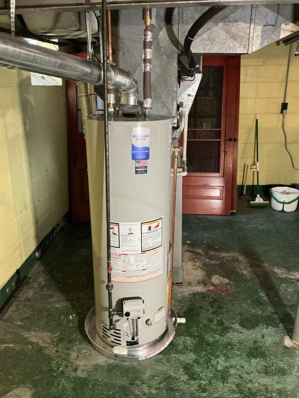 Successfully installed a new 40-gallon hot water heater in utility room, complete with required drip pan. Connected copper supply lines and verified proper operation of all valves and fittings.