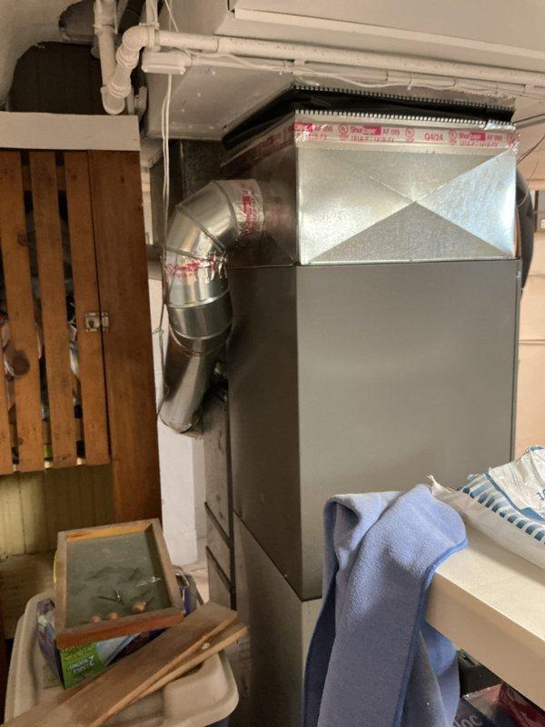 Conducted diagnostic evaluation on 10+ year old basement furnace with non-igniting pilot light. Visual inspection revealed failed heat exchanger, which was documented with photos of the main unit and surrounding crawlspace area. Presented replacement options to customer due to the critical safety concern of the failed component.