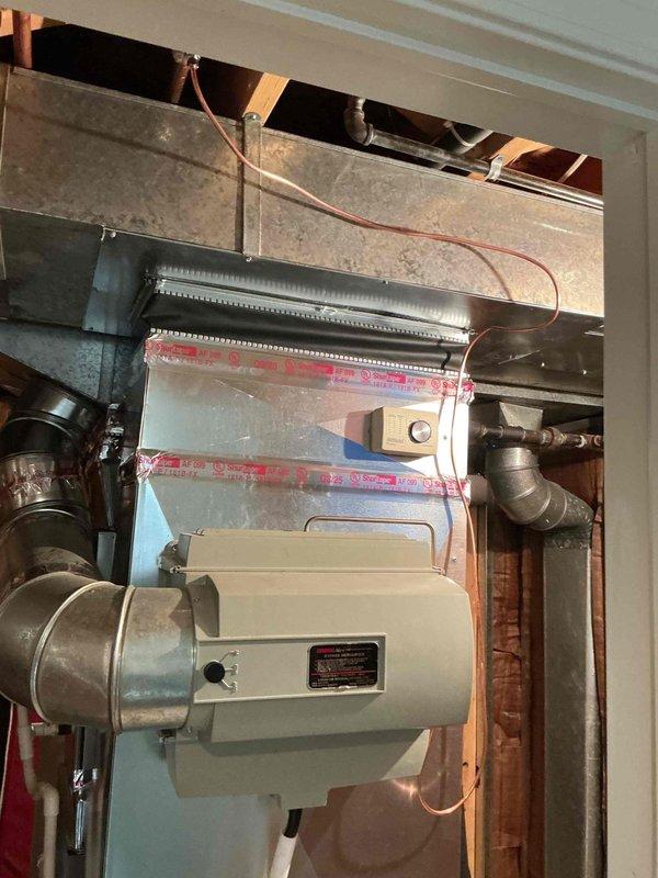 Responded to callback regarding water leakage from humidifier connection. Removed existing saddle valve and installed new 1/4" humidifier shutoff valve to resolve the leak at the cold water line connection to the humidifier.