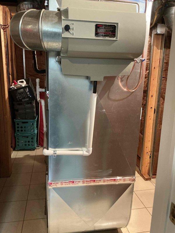 Responded to callback regarding water leakage from humidifier connection. Removed existing saddle valve and installed new 1/4" humidifier shutoff valve to resolve the leak at the cold water line connection to the humidifier.