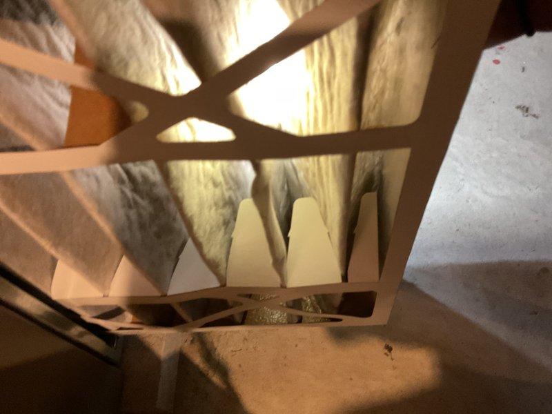 Performed Gold Furnace Inspection on 10-month old forced air system located in basement. Unit was operational upon arrival. Inspected Rheem Classic water heater, noting some discoloration on vent pipe that may indicate early signs of corrosion. Examined insulation and structural components in surrounding utility space, with all systems functioning within normal parameters.