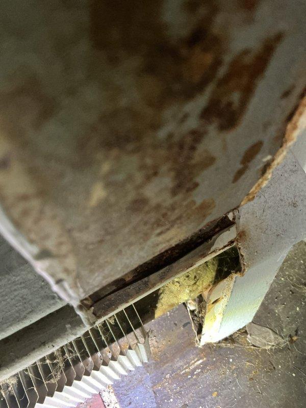 Responded to no-heat call for non-gold boiler. Inspection revealed significant corrosion and deterioration of heat exchanger components with visible oxidation and discoloration. Baseboard heating units showed accumulated dust and debris on fins, reducing heat transfer efficiency.